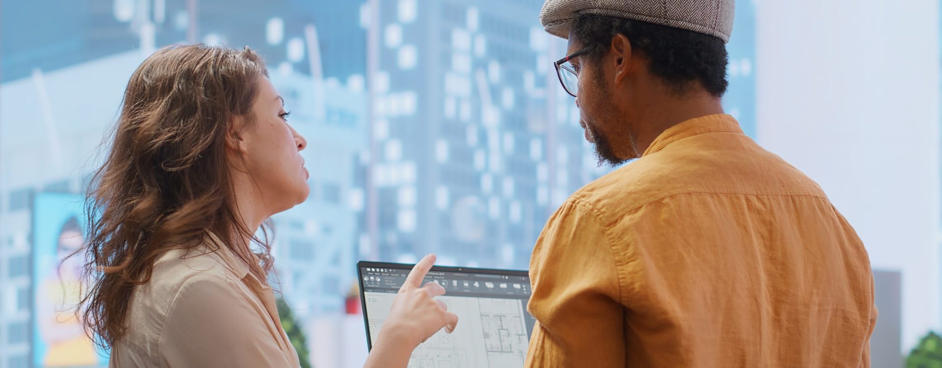 Real estate agent and clients negotiating deals on an office hunt, touring potential workspace property and discussing strategic planning for investment and development. Rental agreement. Camera B.